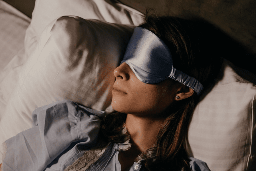 A woman with a sleep mask